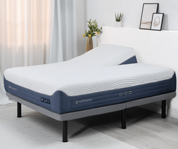Modular BedGear mattress with adjustable headrest, designed for personalized comfort and sustainability, set in a modern bedroom with natural light.